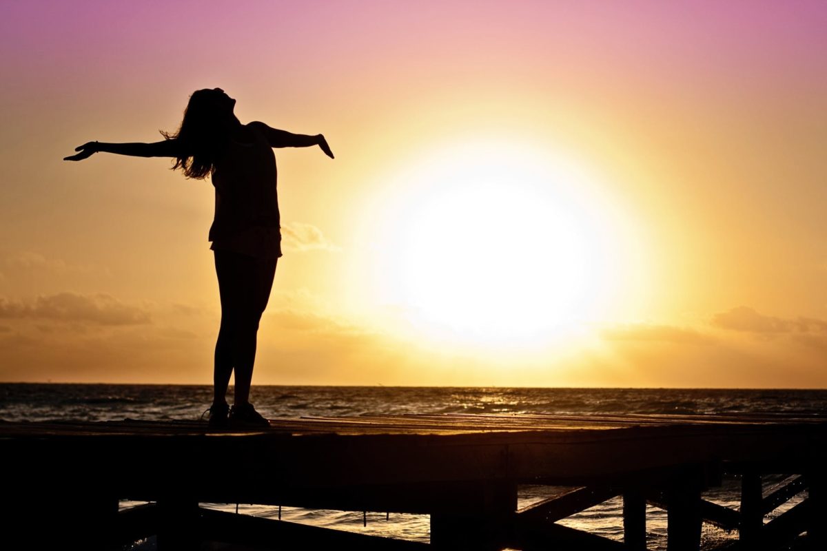 https://www.pexels.com/photo/dawn-sunset-beach-woman-39853/
